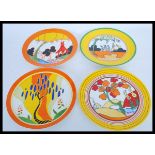 A set of four Clarice Cliff for Wedgwood limited edition collectors cabinet plates by The Bradford