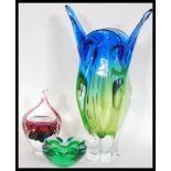 A retro two tone large iridescent studio art glass molar vase together with another two similar