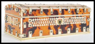 A 19th century Anglo-Indian colonial ivory and tortoiseshell jewellery casket box. Of rectangular