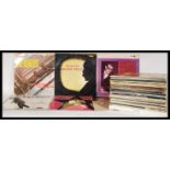 A collection of vinyl long play records featuring many artists and genres to include Little Richard,