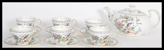 A  bone China tea service by Aynsley in the Pembroke pattern, consisting of tea cups, saucers,