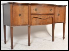 A Georgian revival mahogany satin wood banded serpentine front sideboard credenza, fitted