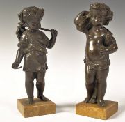 PAIR OF REGENCY SIENNA MARBLE AND BRONZE PUTTI STATUES