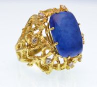 1970'S BLUE STONE AND DIAMOND DRESS RING IN THE MANNER OF ARTHUR KING
