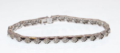 14CT WHITE GOLD AND DIAMOND BRACELET HAVING APPROX 3.5CT'S