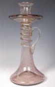 A 17TH CENTURY ENGLISH LARGE HAND BLOWN SODA LASS CHAMBERSTICK