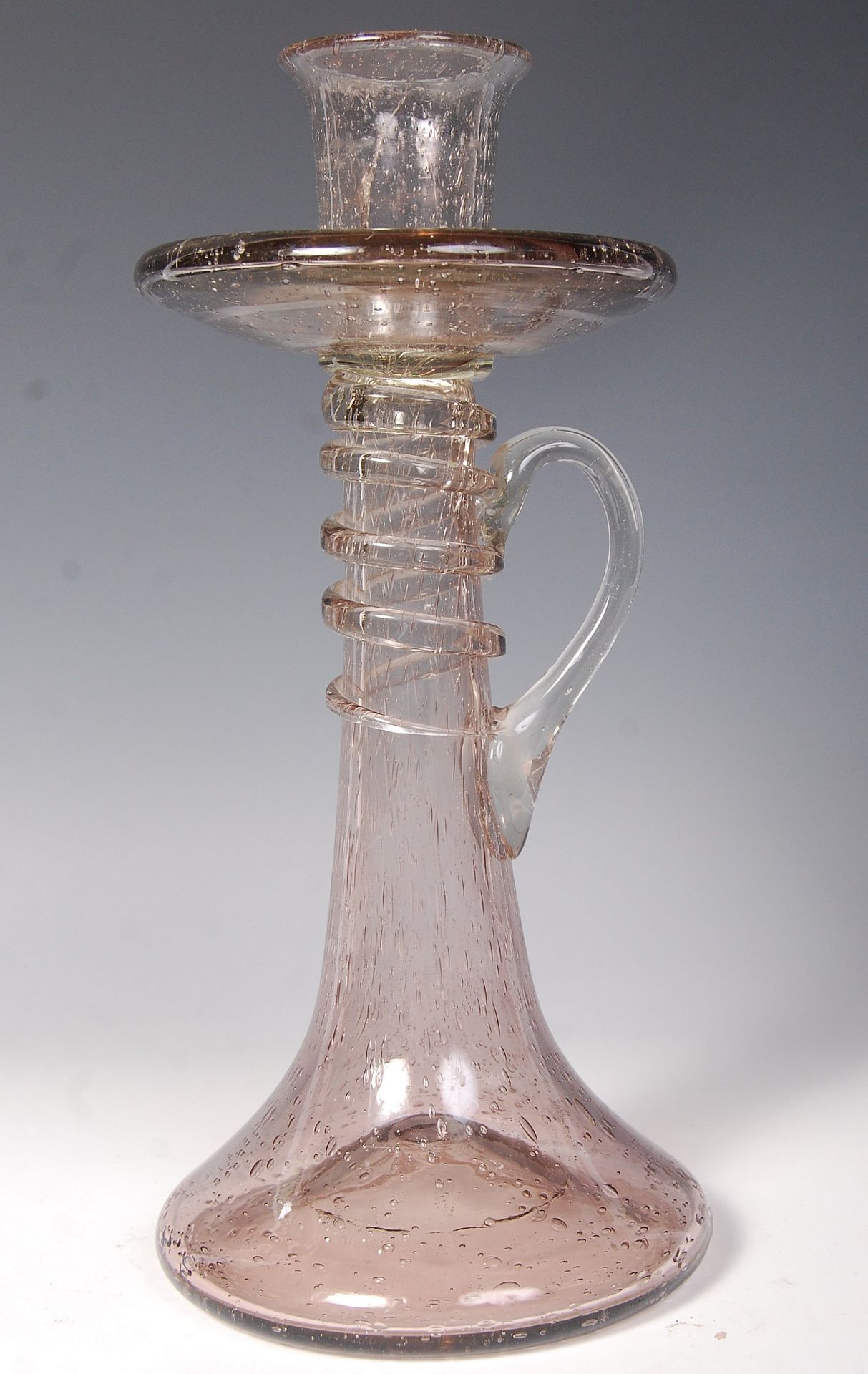 A 17TH CENTURY ENGLISH LARGE HAND BLOWN SODA LASS CHAMBERSTICK