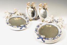 FOUR GERMAN SITZENDORF PORCELAIN CHERUB BARBOLA MIRRORS