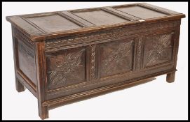 A 17th / 18th century country oak coffer being rai