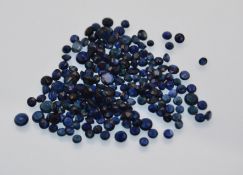 A packet of blue round cut sapphire loose gemstones. Mostly 1-2 mms. Total weight approx 21.5cts.