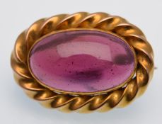 EARLY VICTORIAN GOLD AND GARNET BROOCH