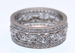 18CT WHITE GOLD AND DIAMOND BAND RING