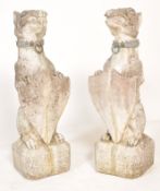 PAIR WEATHERED 20TH CENTURY STONE GROTESQUE GARDEN STATUE DOGS