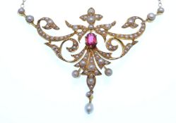 An Edwardian gold, rare red spinel, and half pearl open work necklace marked 15ct