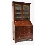 A GEORGE III 18TH CENTURY MAHOGANY INLAID BUREAU BOOKCASE