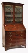 A GEORGE III 18TH CENTURY MAHOGANY INLAID BUREAU BOOKCASE