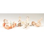 A COLLECTION OF FINE PORCELAIN CHERUB PUTTI FIGURINES