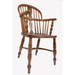 A 19TH CENTURY ENGLISH BEECH WOOD & ELM WINDSOR ARMCHAIR