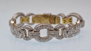 An Art Deco style white gold and diamond bracelet.