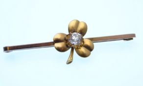 An early 20th century gold brooch in the form of a shamrock