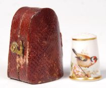 A ROYAL WORCESTER THIMBLE BY W POWELL PAINTED WITH GOLDFINCH