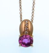 A pink sapphire and diamond pendant, the oval stone approx. 1.25cts