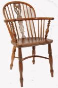 A 19TH CENTURY ENGLISH YEW WOOD & ELM WINDSOR ARMCHAIR