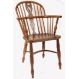 A 19TH CENTURY ENGLISH YEW WOOD & ELM WINDSOR ARMCHAIR