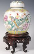 19TH CENTURY CHINESE TEMPLE JAR WITH BIRD OF PARADISE DECORATION