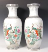 A PAIR OF LARGE CHINESE REPUBLIC PERIOD FLOOR STANDING PEACOCK VASES.