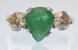 18CT WHITE GOLD PEAR SHAPED EMERALD AND DIAMOND 3 STONE RING
