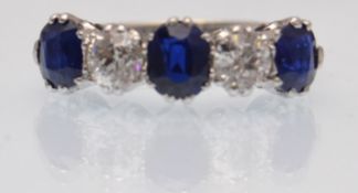 18CT GOLD AND PLATINUM DIAMOND AND SAPPHIRE FIVE STONE RING