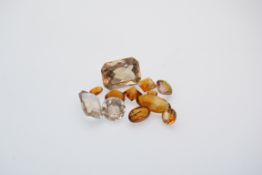 A selection of mixed cut citrine, quartz loose gemstones. Sizes ranging around 5mm to 13mm. Total
