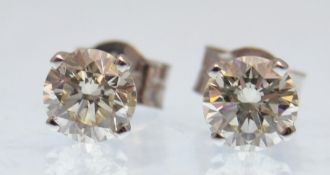 WHITE GOLD LADIES CLAW MOUNTED DIAMOND STUD EARRINGS