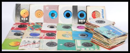 A collection of 45rpm 7" vinyl records featuring v