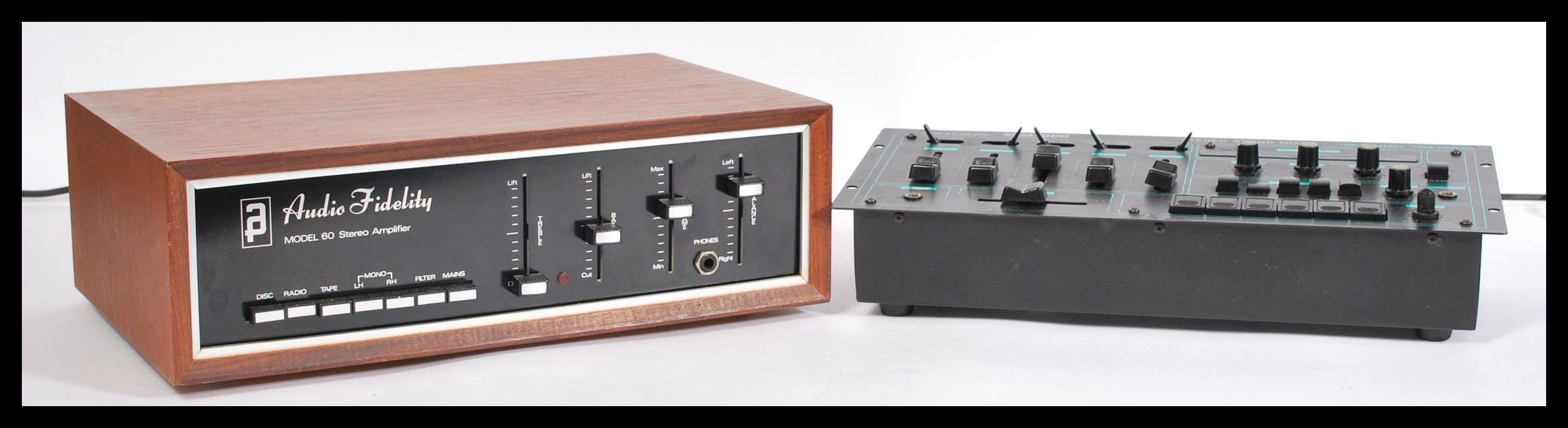 A vintage retro 20th Century teak cased amplifier