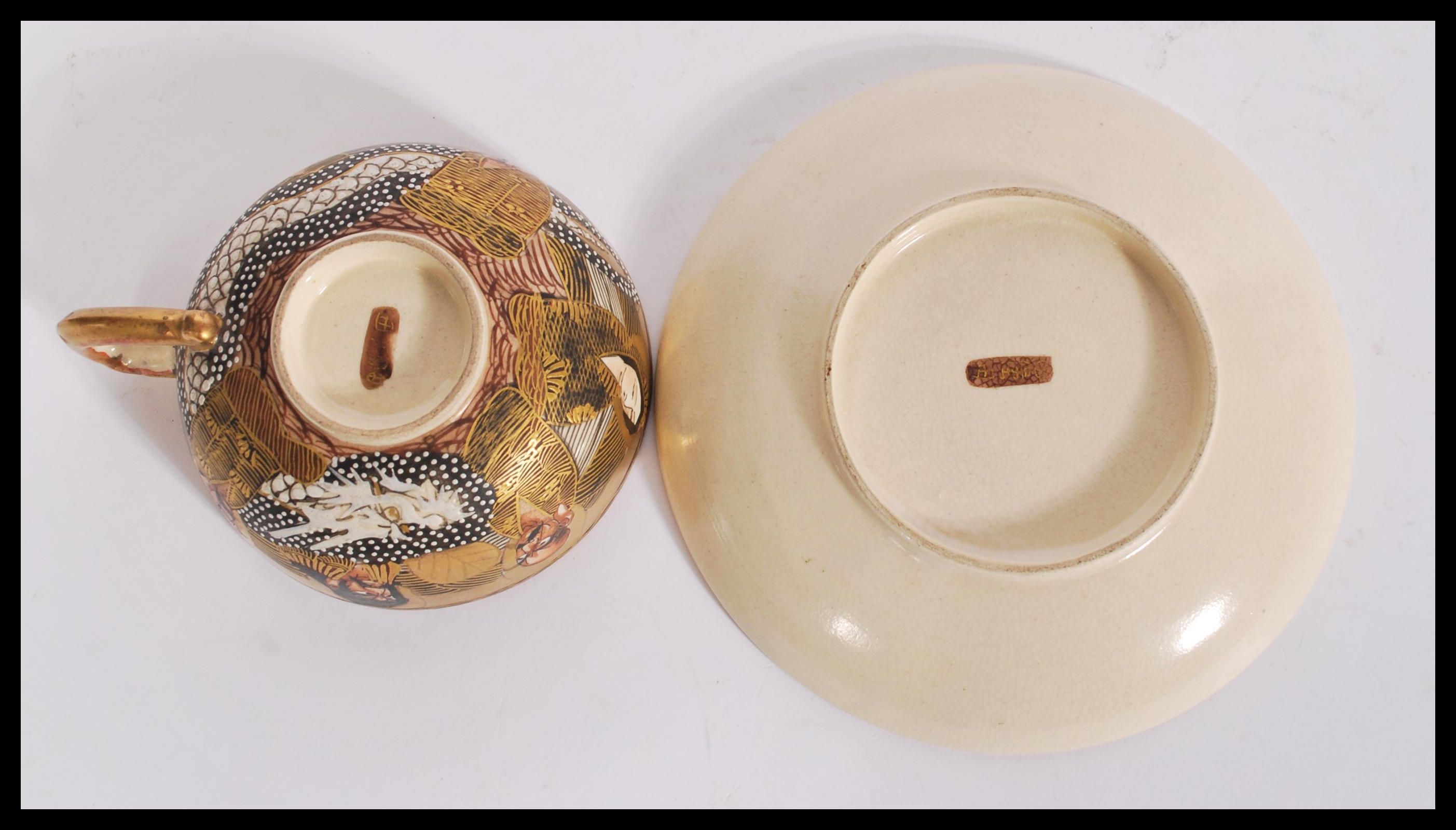 A Japanese Meiji period Satsuma ware cup and sauce - Image 4 of 4