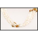 A vintage 20th century baroque pearl multi strand