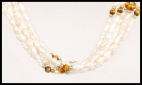 A vintage 20th century baroque pearl multi strand