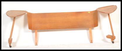 A mid century retro Meredew light oak pair of angu