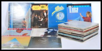 A collection of vinyl long play LP and 12" vinyl s