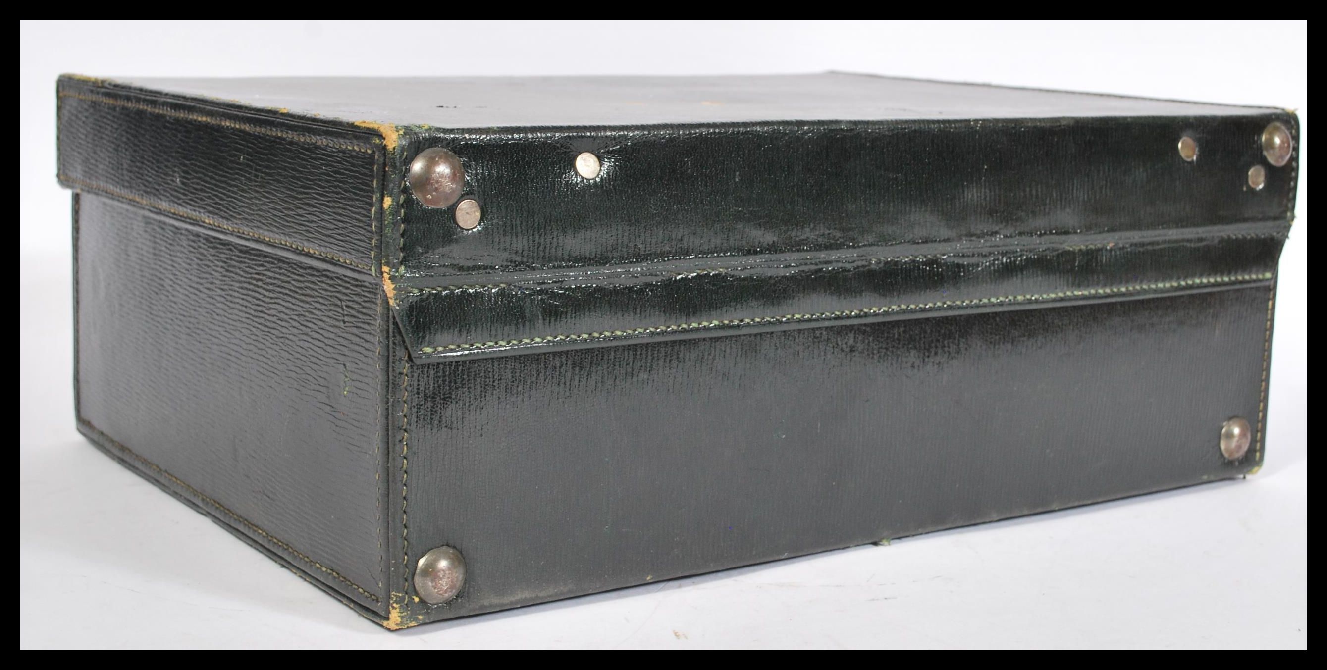 A vintage 20th Century black leatherette suitcase - Image 5 of 5