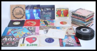 A selection of 1980's vinyl singles records to inc