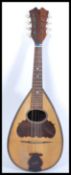 A vintage early 20th Century mandolin musical inst