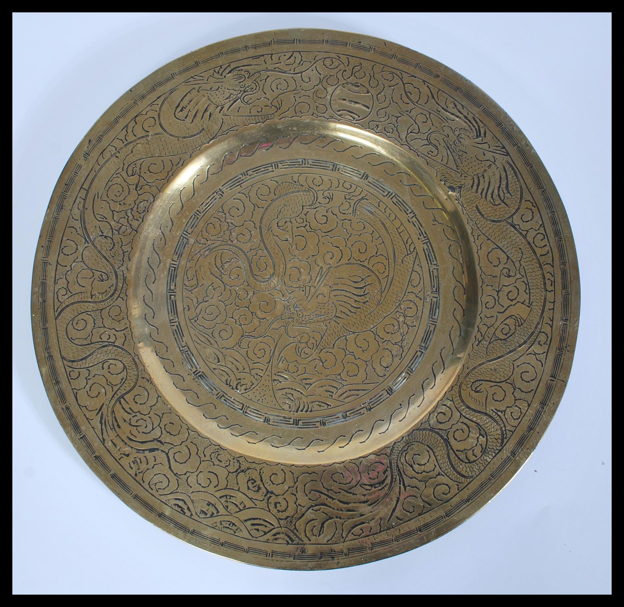 A 19th Century Chinese brass charger plate of circ