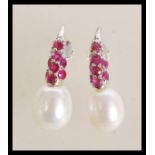 A pair of sterling silver freshwater pearl and rub