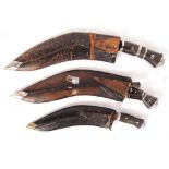 20TH CENTURY MIDDLE EASTERN KUKRI KNIVES WITH SCABBARDS