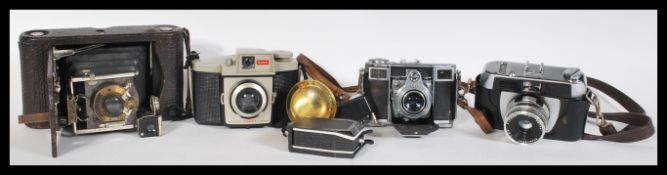 A collection of vintage 20th Century Cameras to in