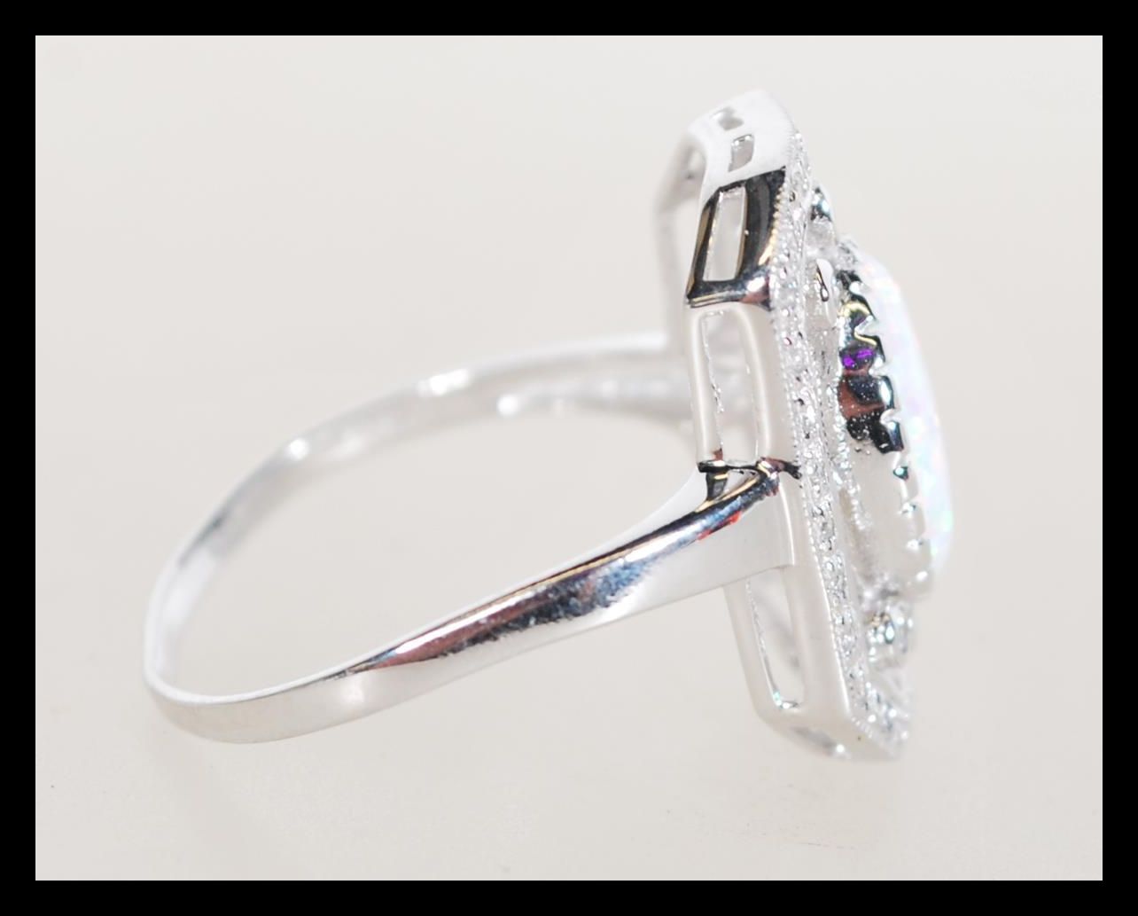 A sterling silver CZ dress ring having a central o - Image 2 of 3