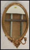A 19th century Victorian oval gilt plaster wall /